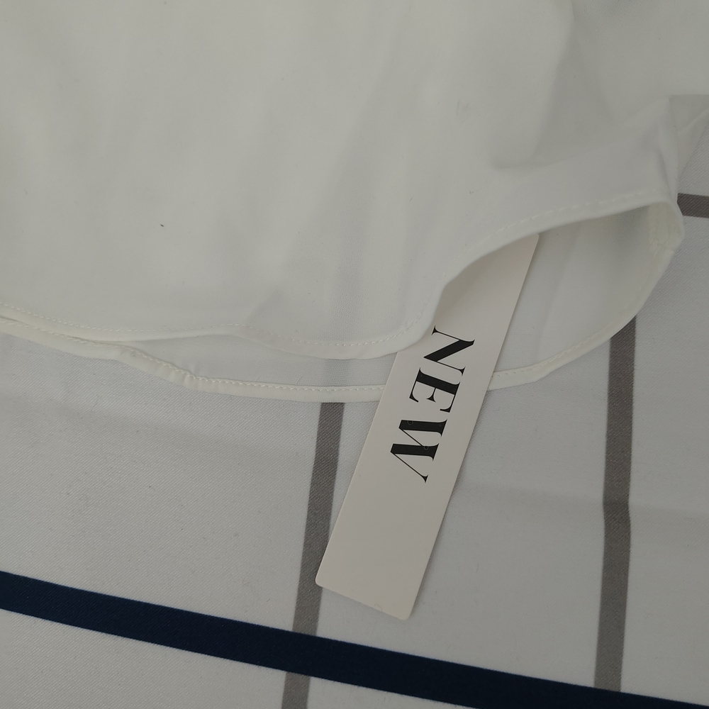 Elegant White Ruffle Blouse - Picture 6 of 8